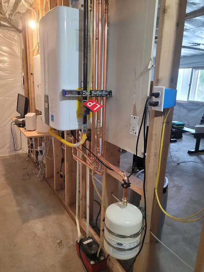 Licensed plumber repairing a kitchen sink in Bound Brook
