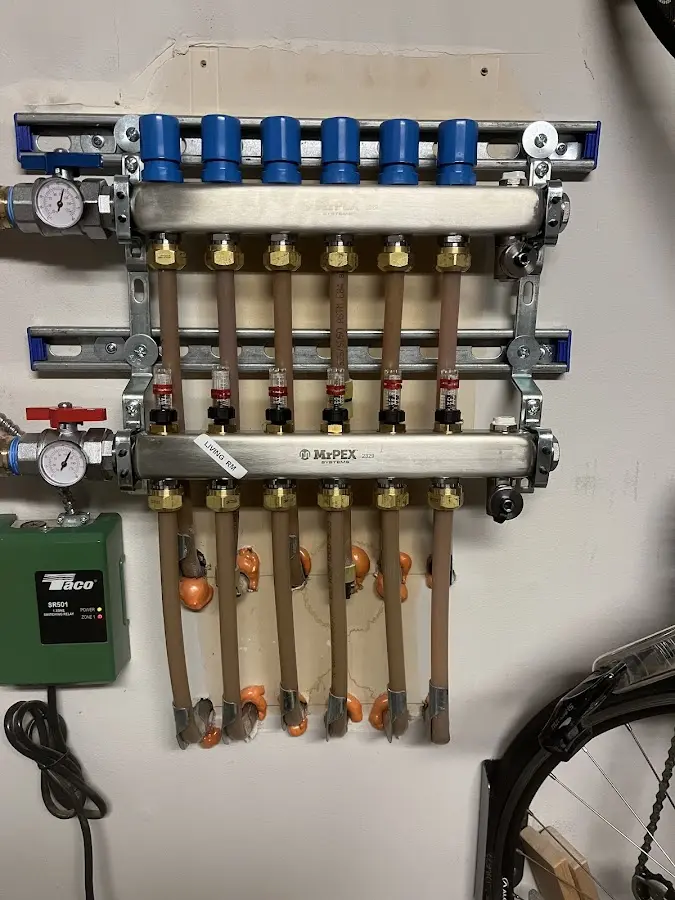 Plumber performing Water Heater Repair at a residential property in Bound Brook